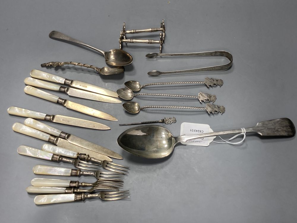 Six pairs of George V mother of pearl handled silver fruit eaters, Sheffield, 1933, etc.